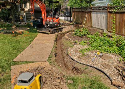 A garden drainage line mid construction