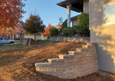 A recently finished brick retaining wall.
