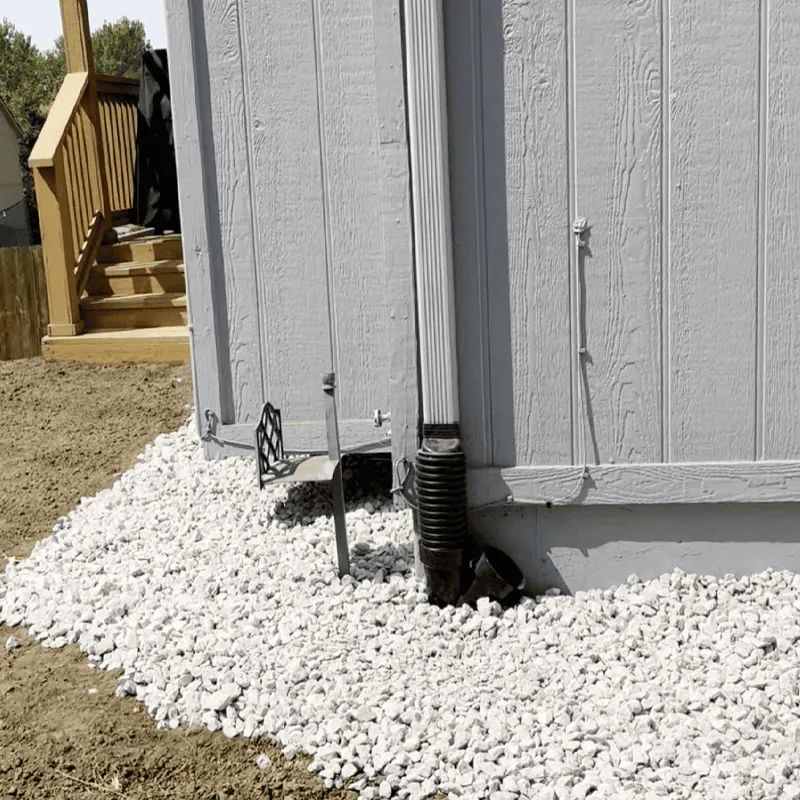 buried downspout after installation