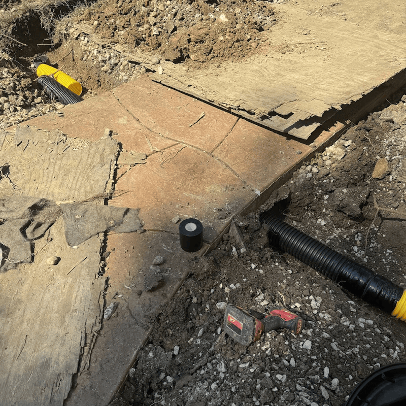 drain pipe under sidewalk