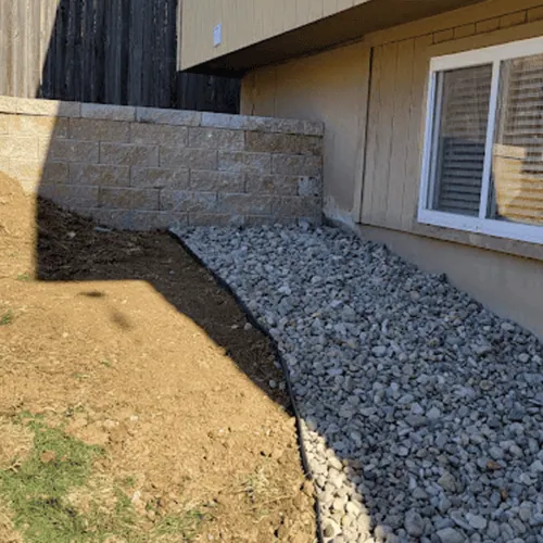 retaining wall next to house