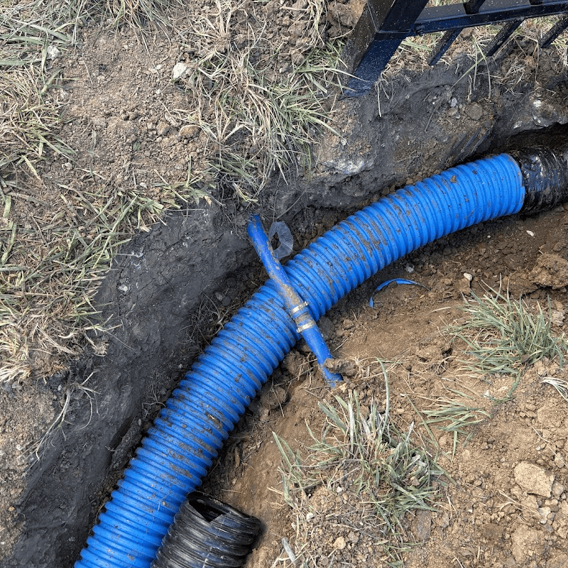 exposed sprinkler water line